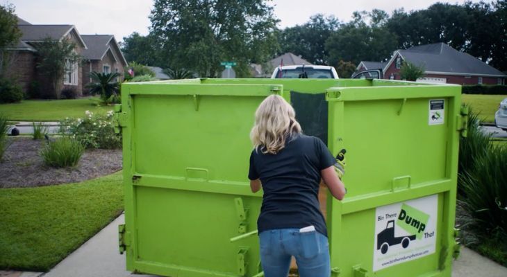 Loading a Dumpster